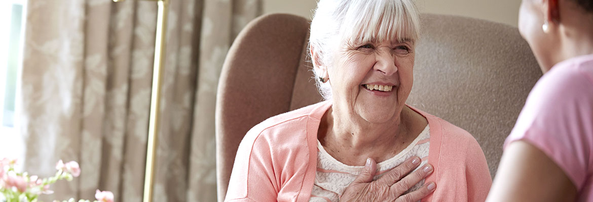 Older lady laughing with a friend