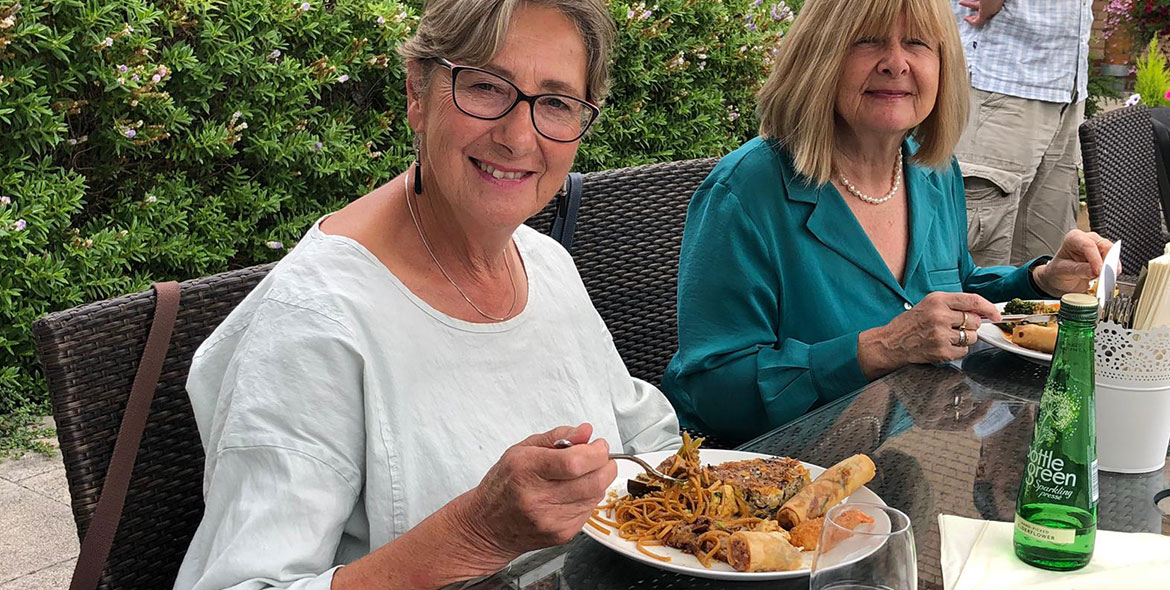 Residents at Girton Green enjoying a Vietnamese buffet