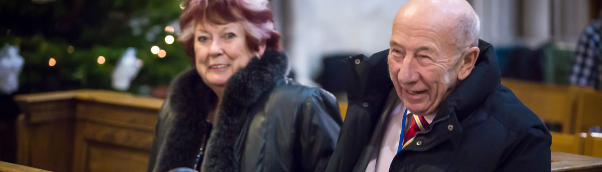 Smiling older people at St Albans Cathedral