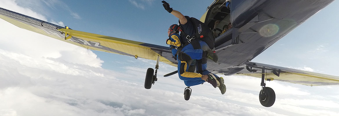 Adeline jumping out of a plane at 15,000 feet