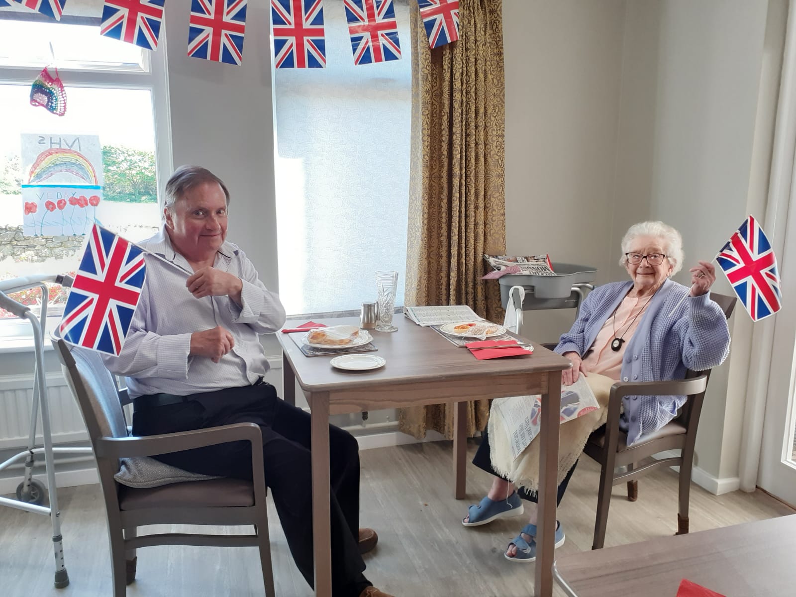 100 year old Kathy enjoying VE Day at Alexander House Image