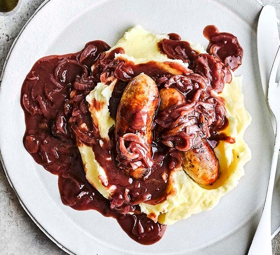 Bangers and mash with onion gravy Image